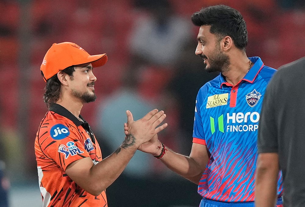 | Photo: AP/Mahesh Kumar A. : Sunrisers Hyderabads captain Ishan Kishan, left, and Delhi Capitals captain Axar Patel, shake hands after toss during the Indian Premier League cricket match between Sunrisers Hyderabad and Delhi Capitals in Hyderabad.