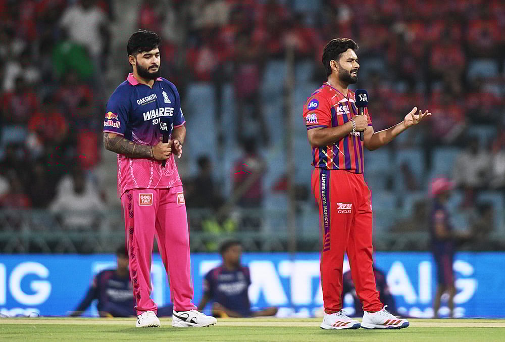 | Photo: AP : Rajasthan Royals captain Riyan Parag, left, looks on as Lucknow Super Giants captain Rishabh Pant talks to a commentator after losing the coin toss of the Indian Premier League cricket match between Lucknow Super Giants and Rajasthan Royals in Lucknow.