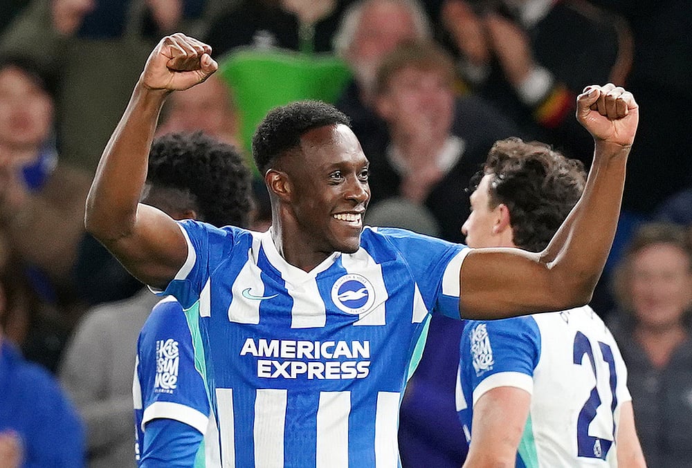 | Photo: Gareth Fuller/PA via AP : Brighton and Hove Albions Danny Welbeck celebrates scoring their third goal during the Premier League soccer match between Brighton and Hove Albion and Chelsea in Brighton, England.
