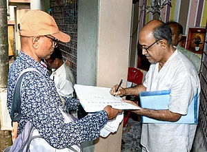 ANI : BLO interact with residents during the house-to-house distribution of Enumeration Forms (EFs) for the second phase of the Special Intensive Revision (SIR) of electoral rolls in Kolkata Kolkata, Nov 05