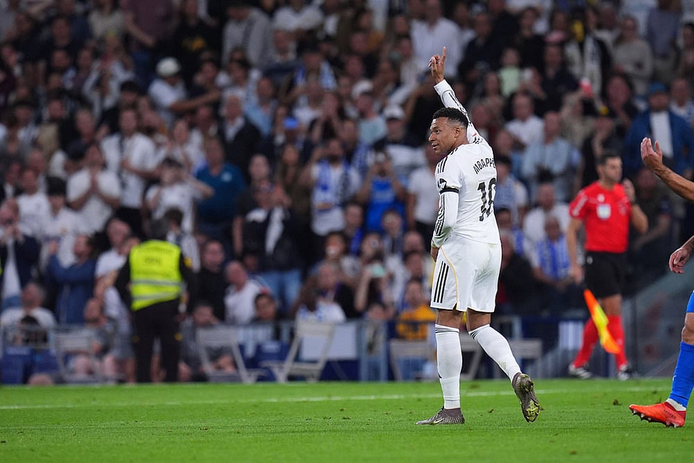 | Photo: AP/Manu Fernandez : Real Madrids Kylian Mbappe celebrates after scoringduring a La Liga soccer match between Real Madrid and Alaves in Madrid, Spain.