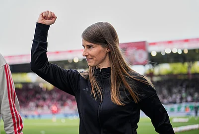 | Photo: AP/Ebrahim Noroozi : New head coach of German Bundesliga soccer club 1. FC Union Berlin Marie-Louise Eta looks on during the warm up prior to the German Bundesliga soccer match between FC Union Berlin and Wolfsburg in Berlin, Germany, Saturday, April 18, 2026.