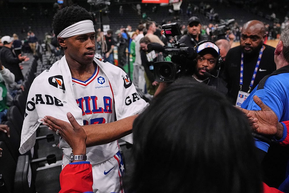 | Photo: AP/Charles Krupa : Philadelphia 76ers guard Vj Edgecombe is congratulated by fans after defeating the Boston Celtics following Game 2 of a first-round NBA playoffs basketball series in Boston.