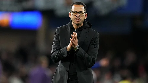 AP/Kirsty Wigglesworth : Chelsea head coach Liam Rosenior leaves the field after the English Premier League match between Chelsea and Manchester United in London.