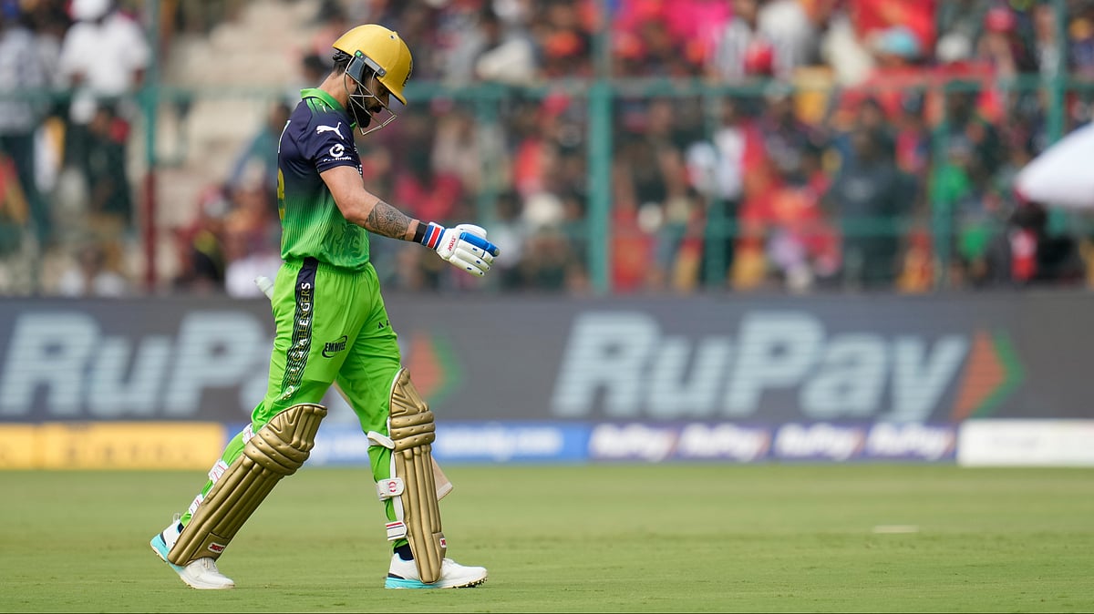 | Photo: AP/Aijaz Rahi : Royal Challengers Bengalurus Virat Kohli walks off the filed after losing his wicket during the Indian Premier League cricket match between Royal Challengers Bengaluru and Delhi Capitals in Bengaluru, India, Saturday, April 18, 2026.
