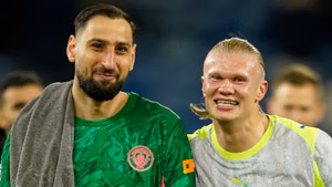 AP/Dave Thompson : Manchester City's goalkeeper Gianluigi Donnarumma, left, and Erling Haaland walk off the pitch.