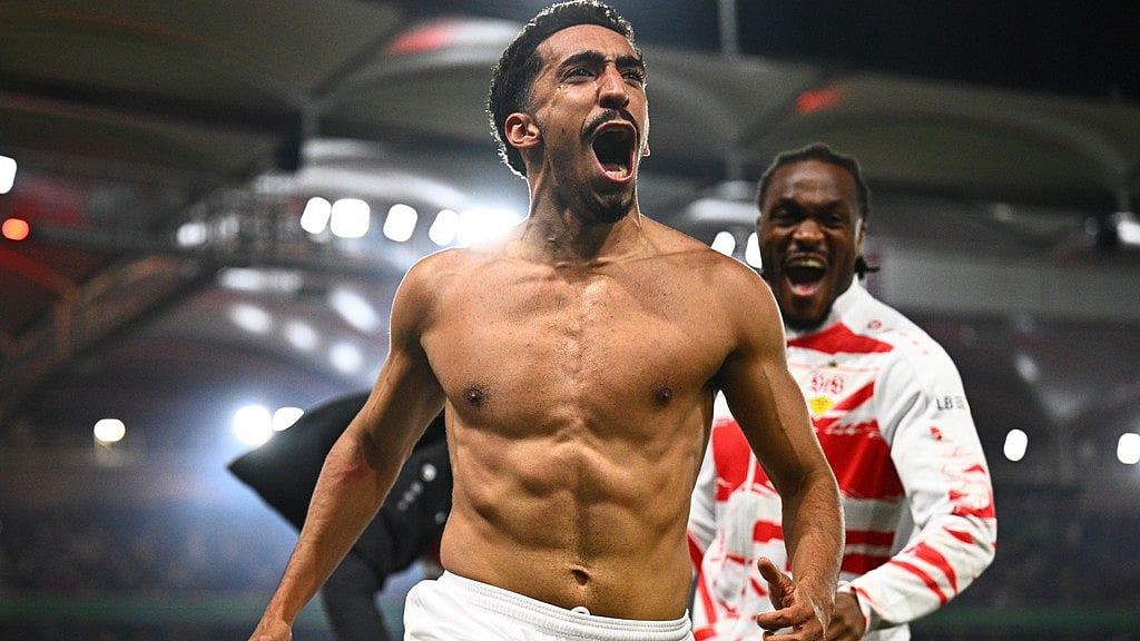 Tom Weller/dpa via AP : Tiago Tomas celebrates scoring the winning goal during the German Cup semi-final between VfB Stuttgart and SC Freiburg.