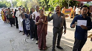 | Photo: Suresh K Pandey/Outlook : Voters show their voter ID cards before casting their votes at one of the polling stations in Egmore, during the Tamil Nadu Assembly elections 2026