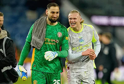 | Photo: AP/Dave Thompson : Manchester Citys goalkeeper Gianluigi Donnarumma and Erling Haaland walk off the pitch after the Premier League soccer match between Burnley and Manchester City in Burnley, England.