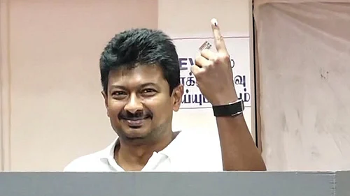 | Photo: PTI : Tamil Nadu Deputy Chief Minister and DMK candidate from Chepauk-Thiruvallikeni constituency, Udhayanidhi Stalin, shows his ink-marked finger after casting a vote in the state Assembly elections, at a polling station, in Chennai.