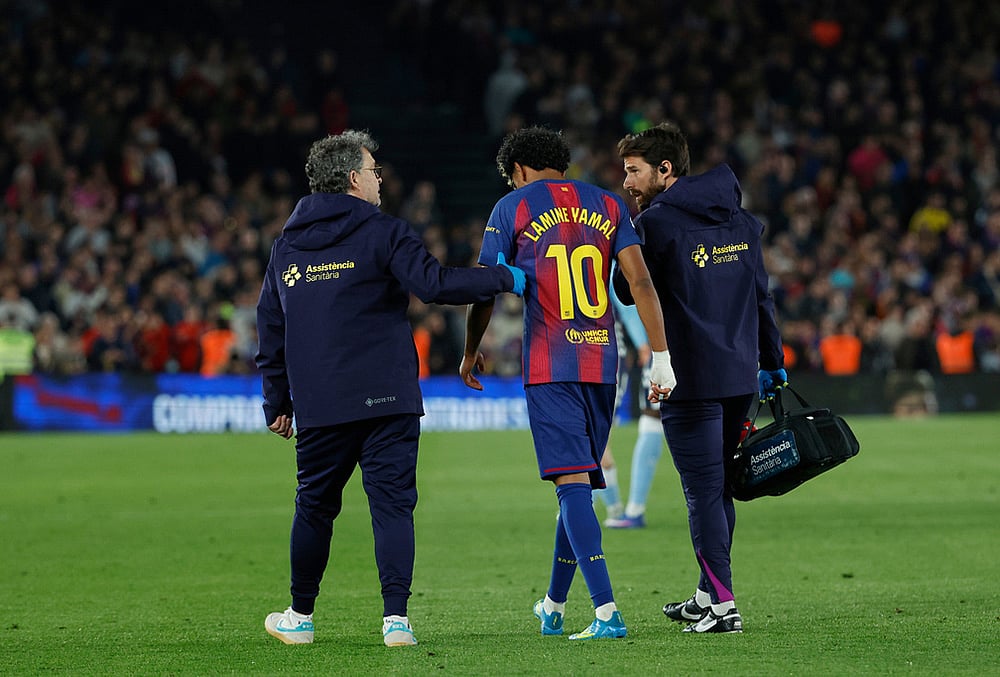 | Photo: AP/Joan Monfort : Barcelonas Lamine Yamal leaves the pitch injured during the Spanish La Liga soccer match between Barcelona and Celta Vigo in Barcelona, Spain.