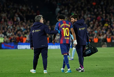 | Photo: AP/Joan Monfort : Barcelonas Lamine Yamal leaves the pitch injured during the Spanish La Liga soccer match between Barcelona and Celta Vigo in Barcelona, Spain.