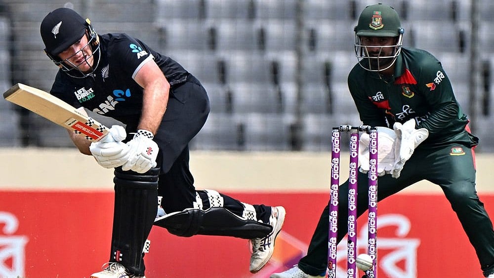 | Photo: AP/Mosaraf Hossain : New Zealands Dean Foxcroft plays a shot during the second one day international cricket match between Bangladesh and New Zealand in Mirpur, Bangladesh.