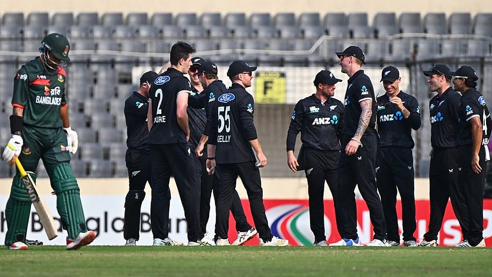 | Photo: AP/Mosaraf Hossain : New Zealand cricketers celebrate the wicket of Bangladeshs Najmul Hossain Shanto, left, during the second one day international cricket match between Bangladesh and New Zealand in Mirpur, Bangladesh.