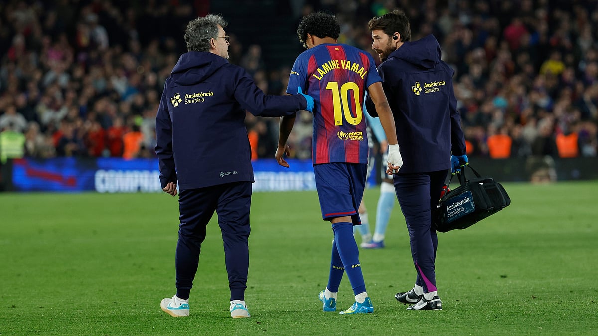 | Photo: AP/Joan Monfort : Barcelonas Lamine Yamal leaves the pitch injured during the Spanish La Liga soccer match between Barcelona and Celta Vigo in Barcelona, Spain, Wednesday, April 22, 2026.