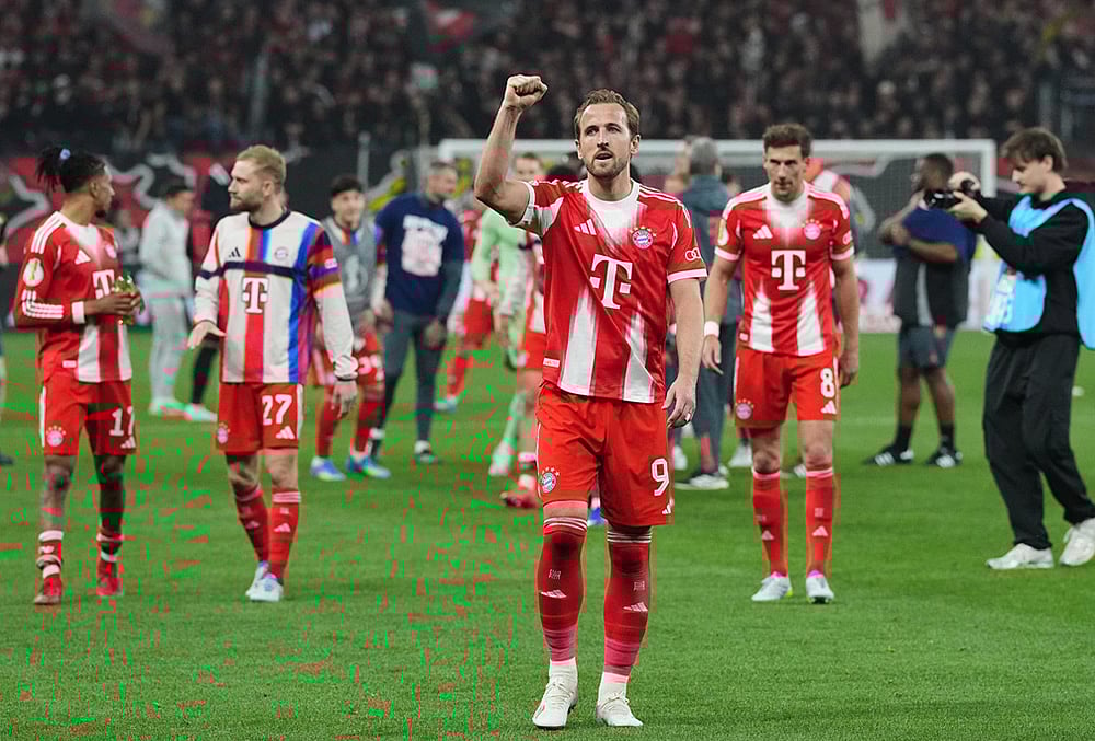 | Photo: AP/Martin Meissner : Bayerns Harry Kane celebrates after the German Soccer Cup semifinal match between Bayer Leverkusen and Bayern Munich in Leverkusen, Germany.