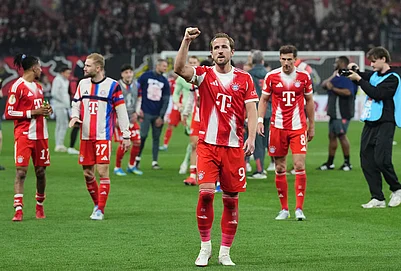 | Photo: AP/Martin Meissner : Bayerns Harry Kane celebrates after the German Soccer Cup semifinal match between Bayer Leverkusen and Bayern Munich in Leverkusen, Germany.