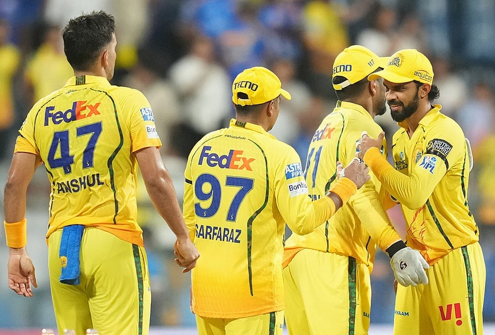 | Photo: AP/Rafiq Maqbool : Chennai Super Kings captain Ruturaj Gaikwad, right, celebrates with teammates after winning the Indian Premier League cricket match between Mumbai Indians and Chennai Super Kings in Mumbai.