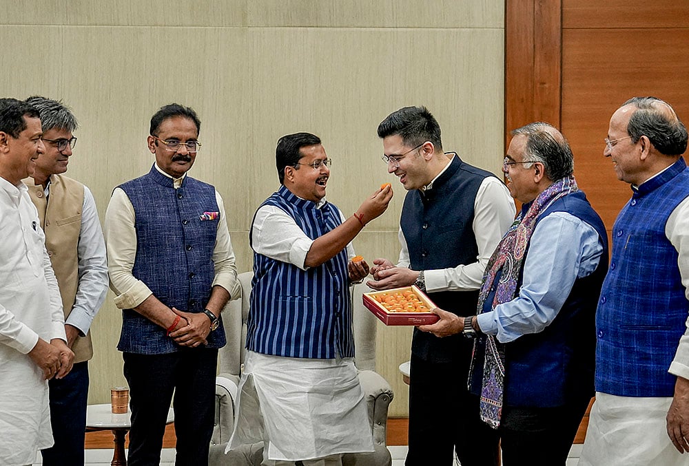| Photo: PTI/Salman Ali : BJP National President Nitin Nabin meets Rajya Sabha MPs Raghav Chadha, Sandeep Pathak and Ashok Mittal at the partys headquarters, in New Delhi. Aam Aadmi Party (AAP) Rajya Sabha MPs Chadha and Sandeep Pathak on Friday announced that they are joining the BJP along with five other MPs of the party. 