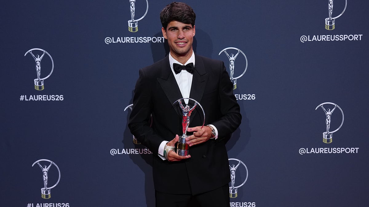 | Photo: AP/Manu Fernandez : Carlos Alcaraz poses with his Laureus World Sportsman of the Year award during the 2026 Laureus World Sports Awards ceremony in Madrid, Spain, Monday, April 20, 2026. 