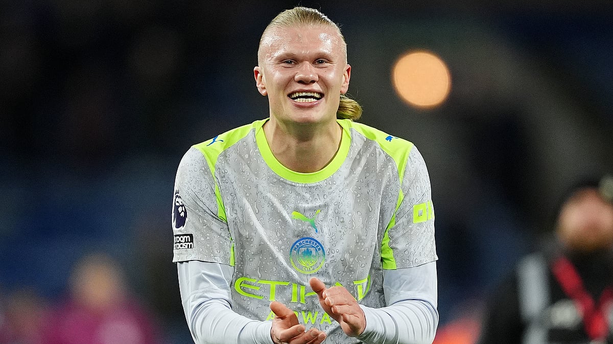 | Photo: AP/Martin Rickett : Manchester City's Erling Haaland celebrates after the Premier League soccer match against Burnley, Wednesday, April 22 2026, in Burnley, England. 