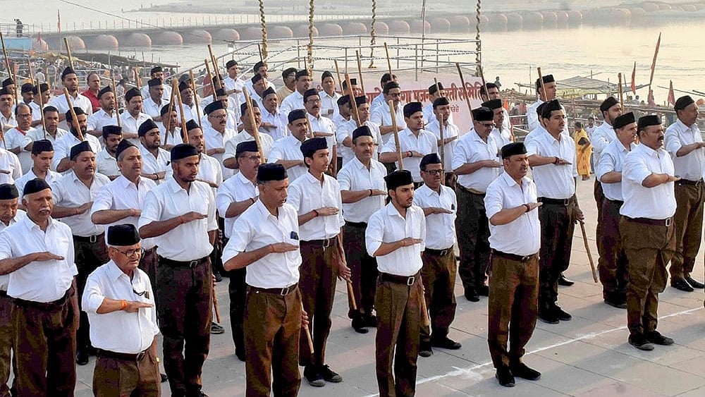 | Photo: PTI | Representative Image  : Rashtriya Swayamsevak Sangh (RSS) workers take part in a programme on the first day of the Hindu New Year, in Prayagraj.