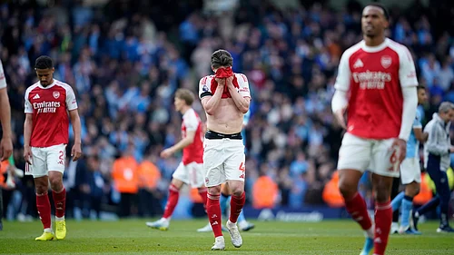 | Photo: AP/Dave Thompson : Arsenals Declan Rice reacts at the end of the English Premier League match between Manchester City and and Arsenal, in Manchester, England, Sunday, April 19, 2026.