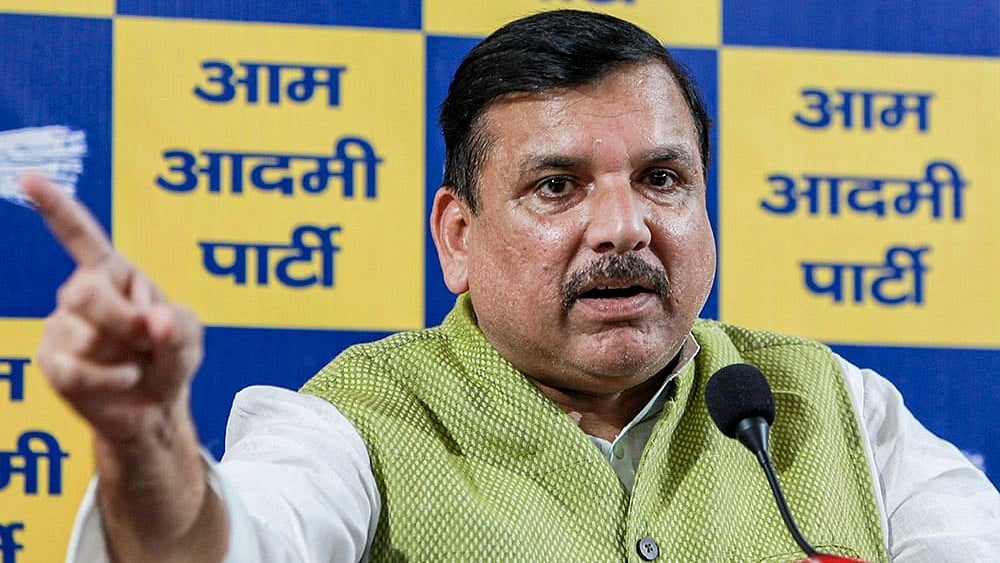 | Photo: PTI : AAP leader Sanjay Singh addresses a press conference, in New Delhi. Singh on Friday slammed the partys Rajya Sabha members defection as a work of the BJP under Operation Lotus, and said that the people of Punjab will not forgive the seven who quit.