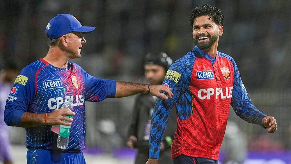 | Photo: PTI/Manvender Vashist Lav : Punjab Kings captain Shreyas Iyer, right, with headcoach Ricky Ponting ahead of an Indian Premier League (IPL) 2026 cricket match between Kolkata Knight Riders and Punjab Kings at Eden Gardens, in Kolkata.