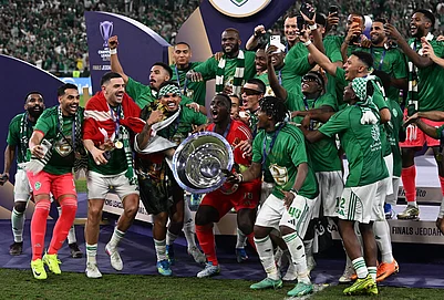 | Photo: AP/Ali Issa : Al-Ahli players celebrate the trophy of AFC Champions League Elite after winning the match against Machida Zelvia, at King Abdullah Sports City Stadium, in Jeddah, Saudi Arabia.