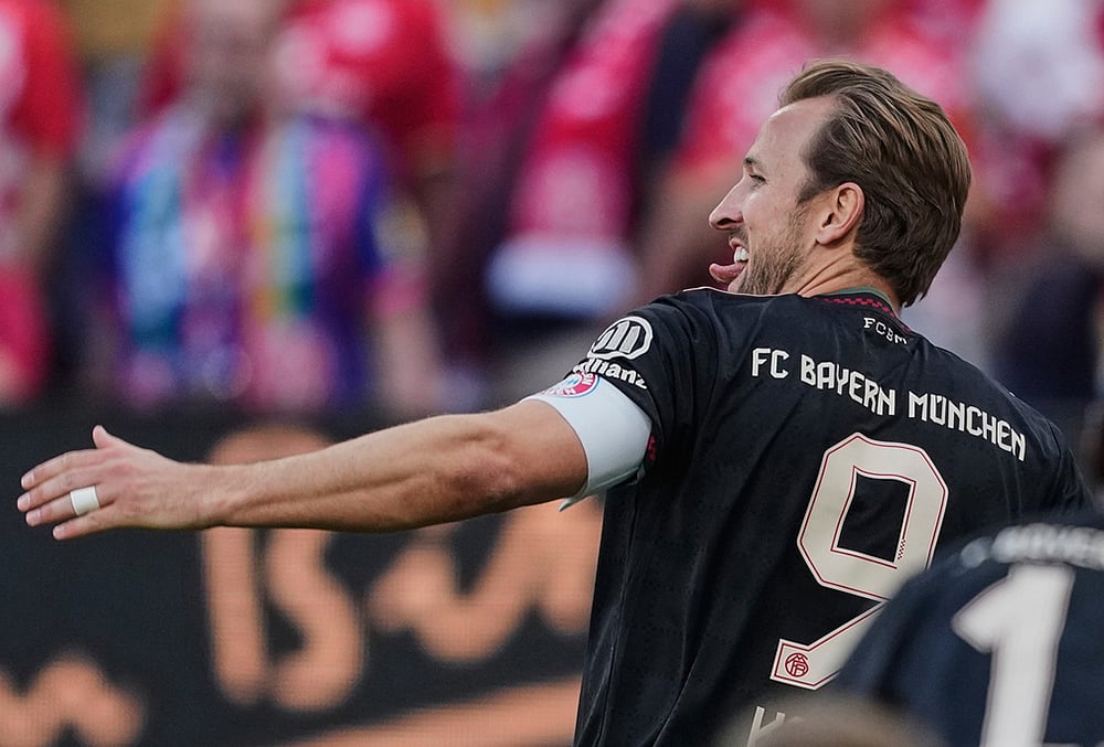| Photo: AP/Michael Probst : Munichs Harry Kane celebrates his sides fourth goal during a German Bundesliga soccer match between FSV Mainz 05 and Bayern Munich in Mainz, Germany.
