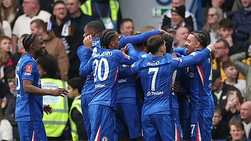Photo: AP : Chelsea players celebrate after Jorrel Hato scored his sides opening goal during the English FA Cup quarter-final against Port Vale in London.