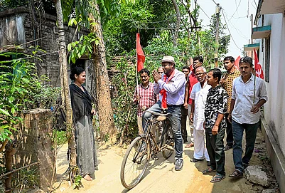 | Photo: PTI : CPI(M) candidate from Santipur constituency, Soumen Mahato, campaigns for the West Bengal Assembly elections, in Nadia.