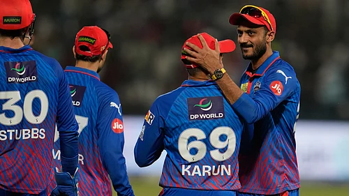 | Photo: AP/Manish Swarup : Delhi Capitals Karun Nair, second from right, celebrates with captain Axar Patel after takes the catch to dismiss Punjab Kings Nehal Wadhera during the Indian Premier League cricket match between Delhi Capitals and Punjab Kings in New Delhi, India, Saturday, April 25, 2026.