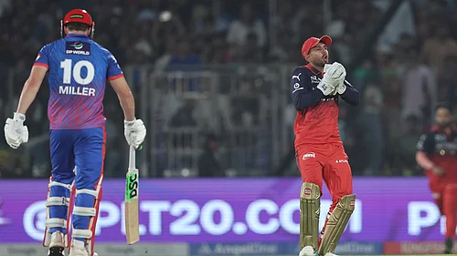 IPL/X : RCBs Jitesh Sharma celebrates a catch against Delhi Capitals in the IPL 2026 clash at the Arun Jaitley Stadium in Delhi.