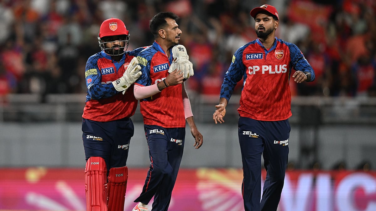 | Photo: AP : Punjab Kings Yuzvendra Chahal, centre, celebrates with teammates the wicket of Rajasthan Royals Yashasvi Jaiswal during the Indian Premier League cricket match between Rajasthan Royals and Punjab Kings in New Chandigarh, India, Tuesday, April 28, 2026.