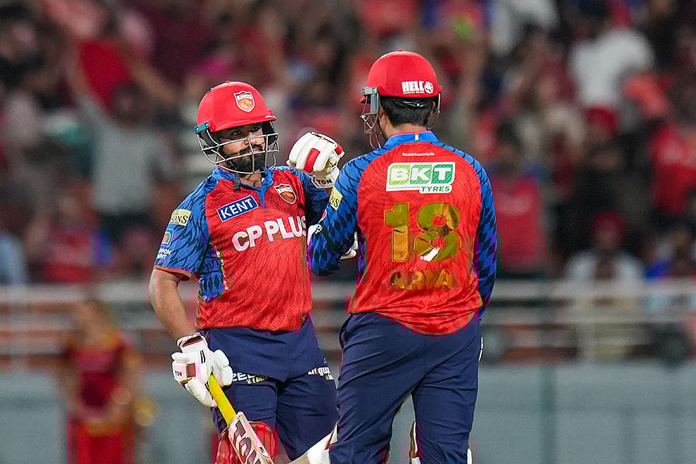 | Photo: PTI/Shiva Sharma : Punjab Kings Priyansh Arya, right, and Prabhsimran Singh interact between the wickets during the Indian Premier League (IPL) 2026 T20 cricket match between Punjab Kings and Rajasthan Royals, in Mullanpur.