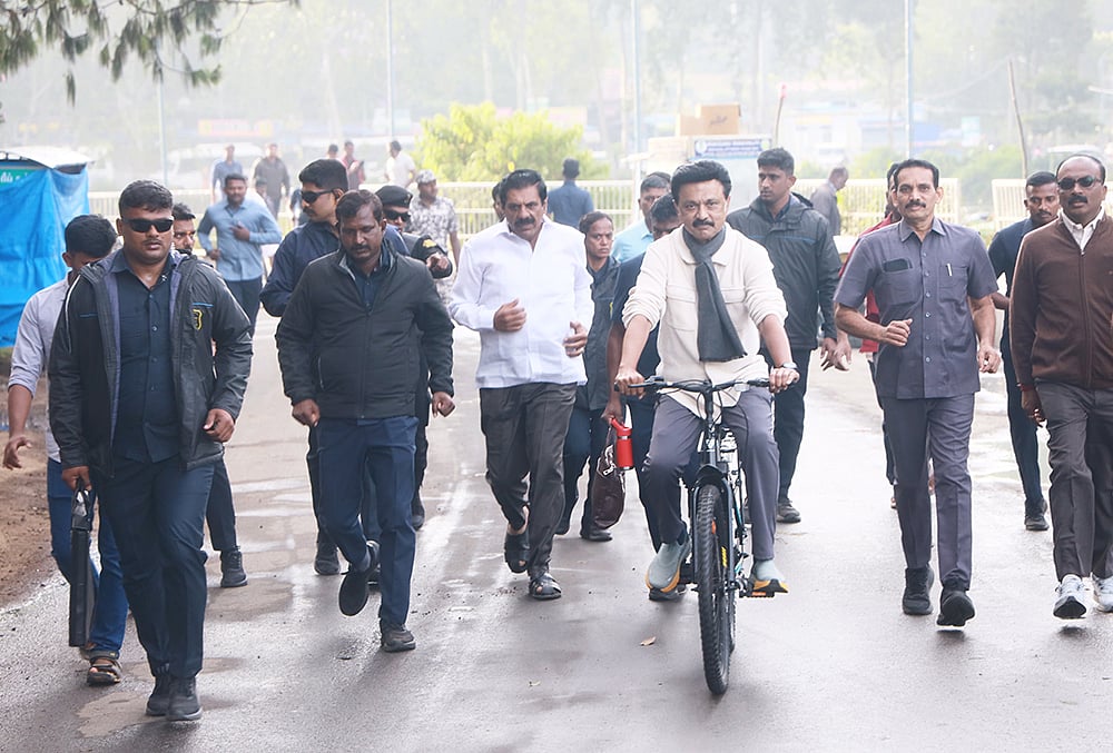 | Photo: PTI : Kodaikanal: Tamil Nadu Chief Minister MK Stalin cycles near the Kodaikanal Lake, post the election campaigns for the state Assembly elections, at Kodaikanal, in Dindigul district.