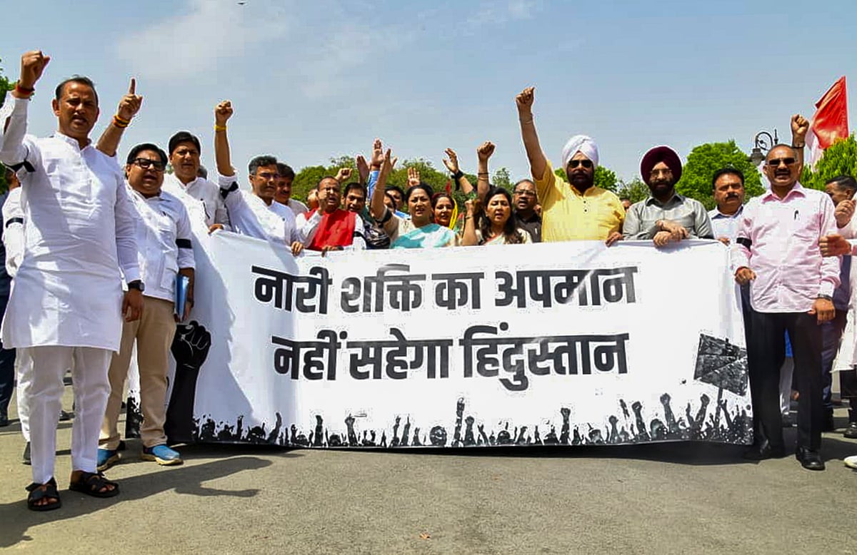 PTI : Delhi Chief Minister Rekha Gupta with BJP leaders, takes part in a protest rally over Nari Shakti Vandan Adhiniyam