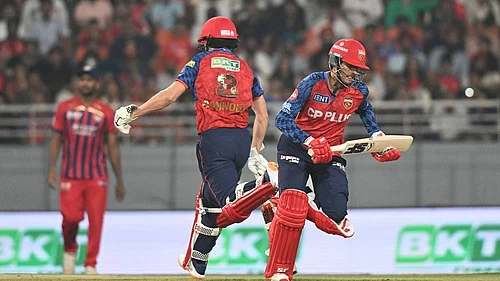 | Photo: AP : Punjab Kings Priyansh Arya, right, and his batting partner Cooper Connolly run between the wickets during the Indian Premier League cricket match between Punjab Kings and Lucknow Super Giants in New Chandigarh, India.