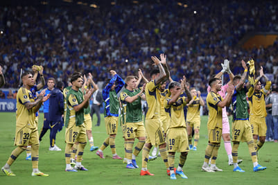 | Photo: AP/Gilson Lobo : Players of Argentinas Boca Juniors greet their supporters at the end of a Copa Libertadores Group D soccer match against Brazils Cruzeiro in Belo Horizonte, Brazil.