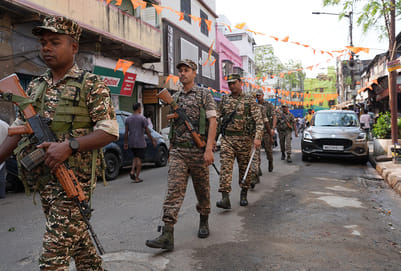 | Photo: Sandipan Chatterjee/ Outlook : Security personnel conduct a route march amid the West Bengal Assembly elections 2026