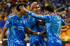 | Photo: AP/John Amis : UANL Tigres forward Ángel Correa, right, celebrates his goal against Nashville SC with Francisco Reyes, second from right, and other team mates during the first half of an CONCACAF Champions Cup first leg semifinal soccer match in Nashville, Tennessee.