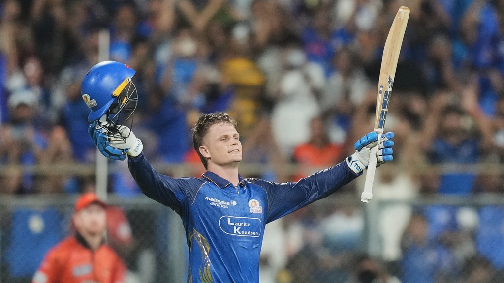 AP Photo/Rafiq Maqbool : Mumbai Indians Ryan Rickelton celebrates his century during the Indian Premier League cricket match between Mumbai Indians and Sunrisers Hyderabad in Mumbai, India, Wednesday, April 29, 2026.