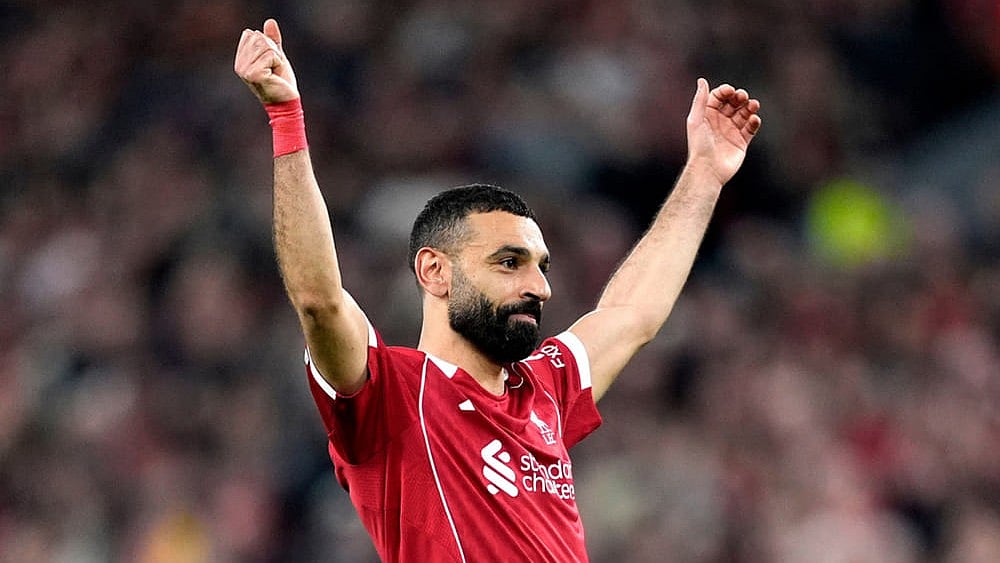 | Photo: AP/Jon Super : Liverpools Mohamed Salah celebrates scoring his sides fourth goal  during the second leg of the Champions League round of 16 soccer match between Liverpool and Galatasaray, in Liverpool, England.
