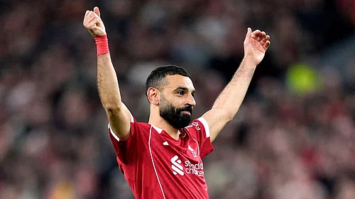 | Photo: AP/Jon Super : Liverpools Mohamed Salah celebrates scoring his sides fourth goal during the second leg of the Champions League round of 16 soccer match between Liverpool and Galatasaray, in Liverpool, England.