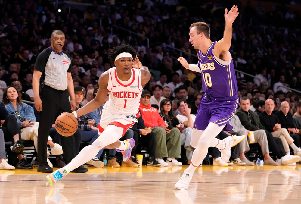 | Photo: AP/Mark J. Terrill : Houston Rockets guard Amen Thompson, left, drives by Los Angeles Lakers guard Luke Kennard during the second half in Game 5 of a first-round NBA playoffs basketball series in Los Angeles. 