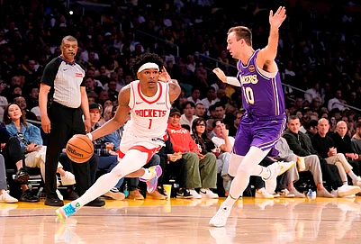 | Photo: AP/Mark J. Terrill : Houston Rockets guard Amen Thompson, left, drives by Los Angeles Lakers guard Luke Kennard during the second half in Game 5 of a first-round NBA playoffs basketball series in Los Angeles.