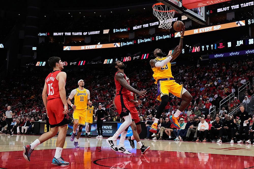 | Photo: AP/Ashley Landis : Los Angeles Lakers forward LeBron James (23) shoots during the first half of Game 6 of a first-round NBA playoffs basketball series against the Houston Rockets in Houston.