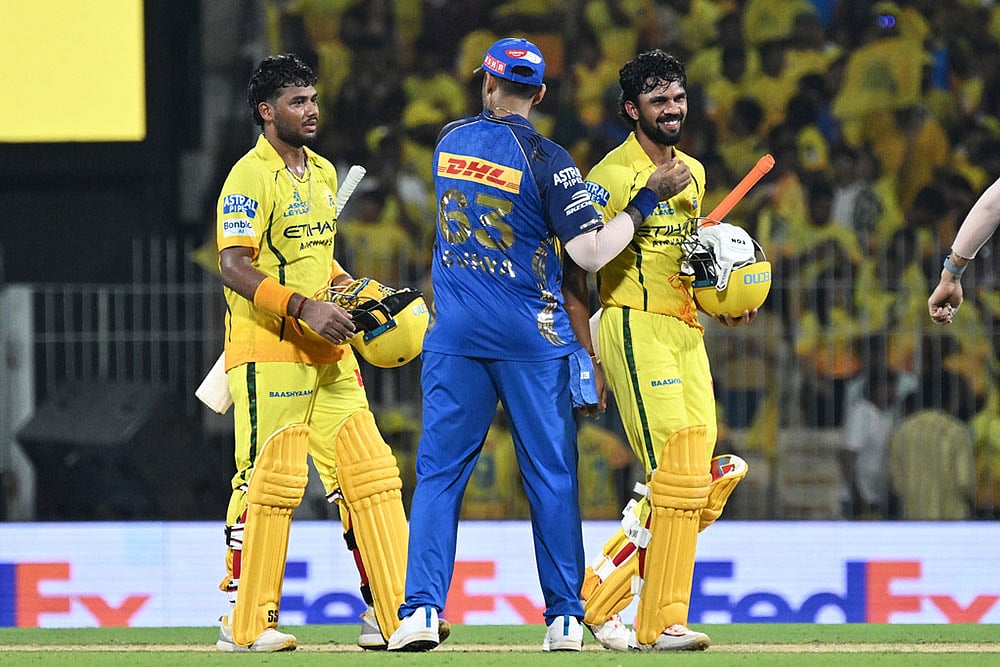 | Photo: AP : Chennai Super Kings captain Ruturaj Gaikwad, right, is congratulated by Mumbai Indians Suryakumar Yadav after Chennai Super Kings won the Indian Premier League cricket match between against Mumbai Indians in Chennai, India.